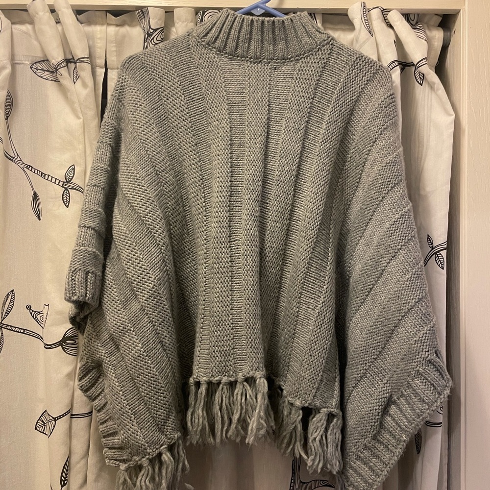 Forever 21 fringe poncho, size small.